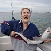 This is Courtney from the USA who was very happy with this 4lb smoothound caught on John Old&#039;s High Flyer II out of Great Yarmouth.