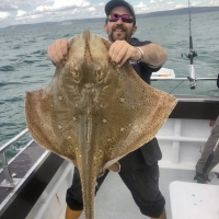 7 Dave Poultney with a 25lb 7oz blonde ray caught on a turbot mark out of Swanage aboard San Gina 2