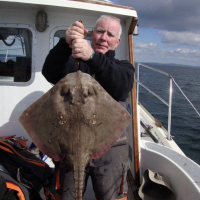 5.Patrick Daniels with a thornback ray weighing 15lb caught on Broadsword from Laugherne in West Wales