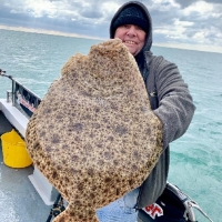 8.Keiron Guppy with a wonderful 15lb turbot on Dan Clarkes boat Fins Up from Protland
