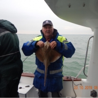 Chris Hurst with a 6lb 4oz spotted ray caught on his own boat Lady Ann 4 in the Solent