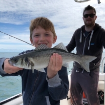 ack Doughty caught this bass from his grandad Kevin&#039;s boat off his own cast on a 7ft 7inch LRF rod, rated to just 8 grams, on a 90mm Fiiish Black Minnow and played it beautifully all the way into the net