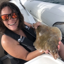 7 Peggy Dellis with a good sized 2lb 3oz plaice caught on a well known hastings mark, she was on her and her husbands boat moored in the marina at Eastbourne